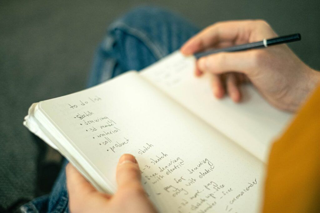 pexels-photo-4238511 Person Writing a to do List